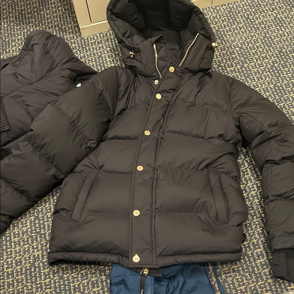 Aritzia Black Puffer Jacket with Gold Accents